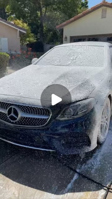 Mercedes coupe covered in foam, from a reel