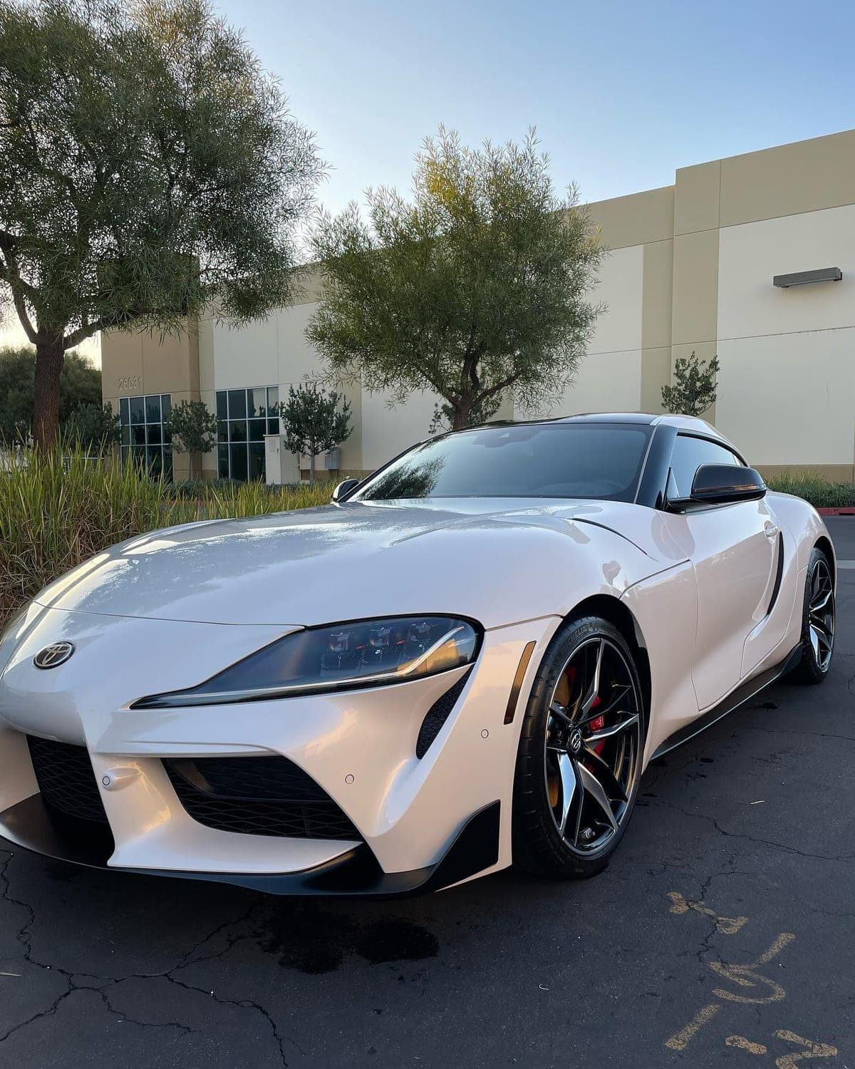 Toyota Supra headlight and wheel after detailing